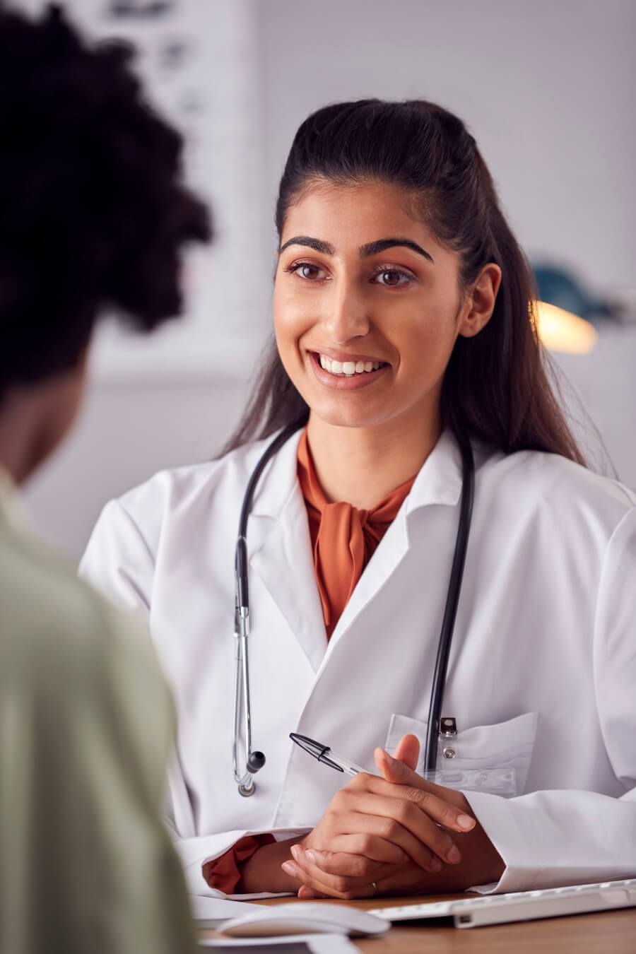 female doctor in white coat having meeting with wo 2023 11 27 04 58 11 utc